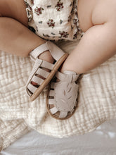 Load image into Gallery viewer, Baby Willow Sandal, made from soft wax leather, featuring a Willow leaf embroidery, soft suede soles, and a velcro strap, with a closed-in toe and heel design, perfect for first walking shoe.
